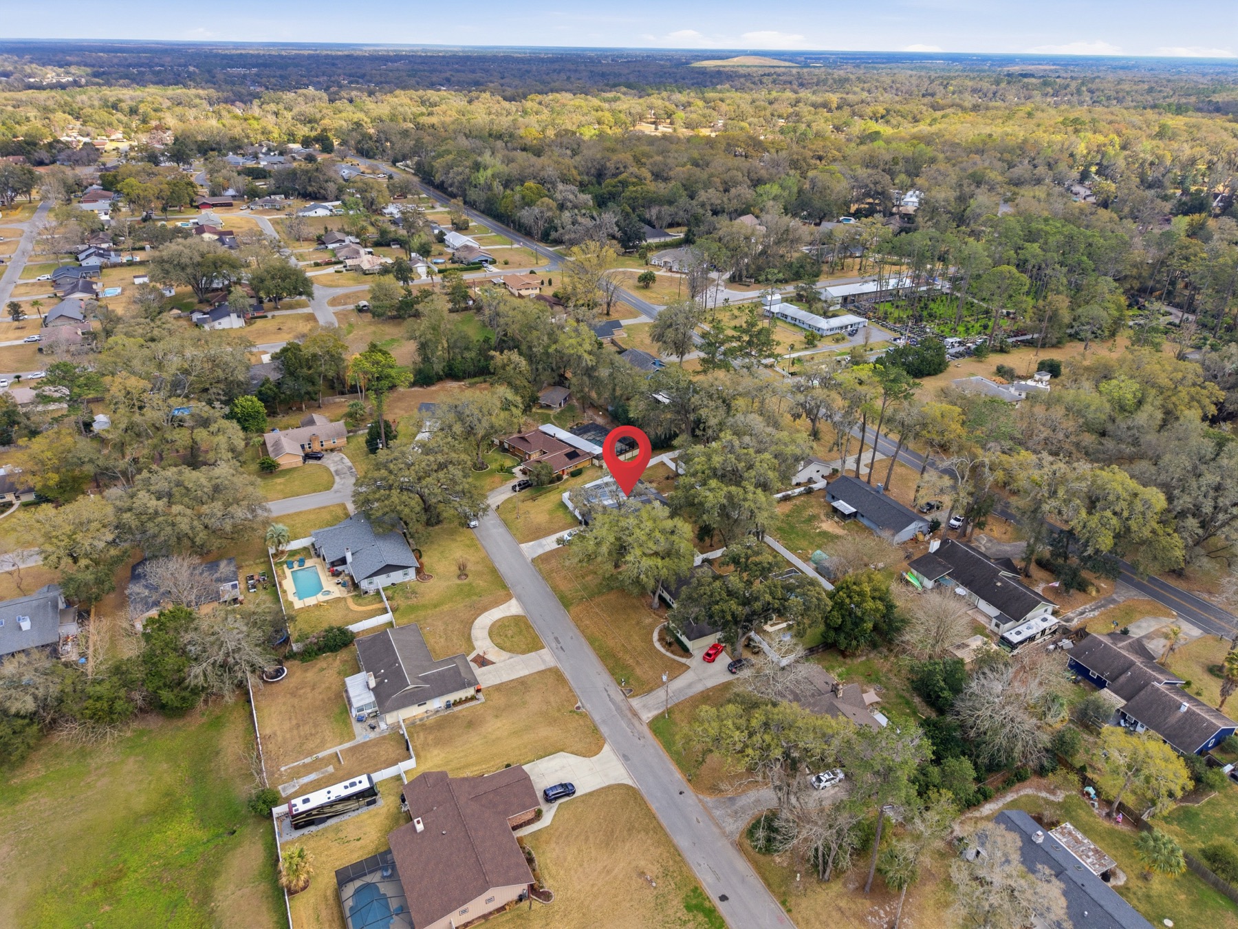 Aerial drone view of 2580 SE 37th St with neighborhood context in Shady Wood, SE Ocala